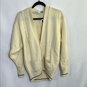 Cream Cardigan Sweater with deep v neck buttons with navy contrast hem stitch
